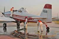 Crew prepping plane for service
